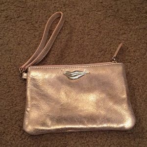 DVF rose gold wristlet